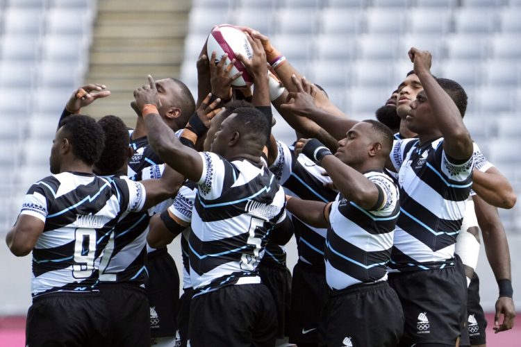 Fiji beats Japan to open Olympic rugby sevens title defense